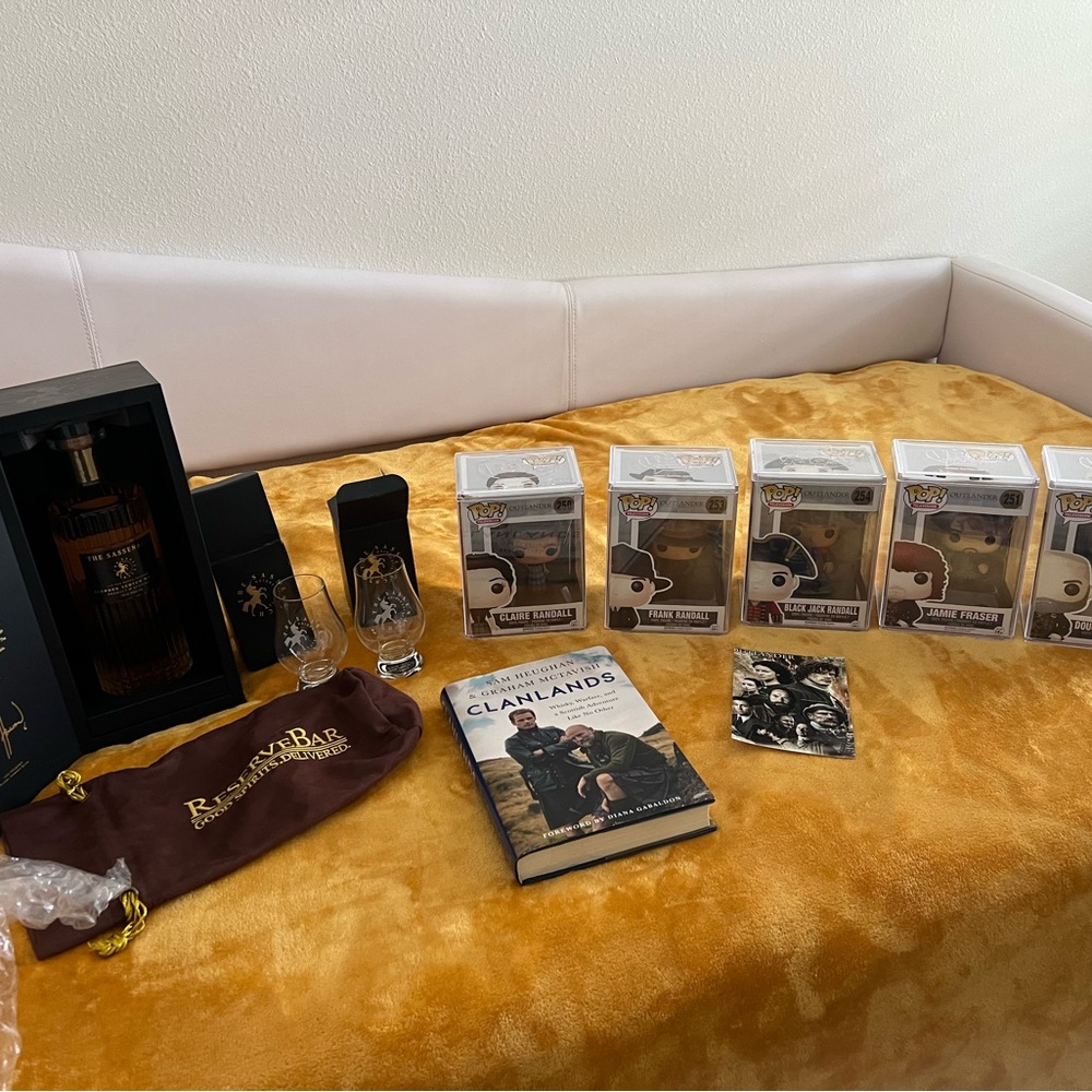 Outlander POP collection with book and Spirit with two cups.